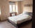 Appartement rez-de-jardin 3 pièces 80 m² à Cernay - Chambre parentale