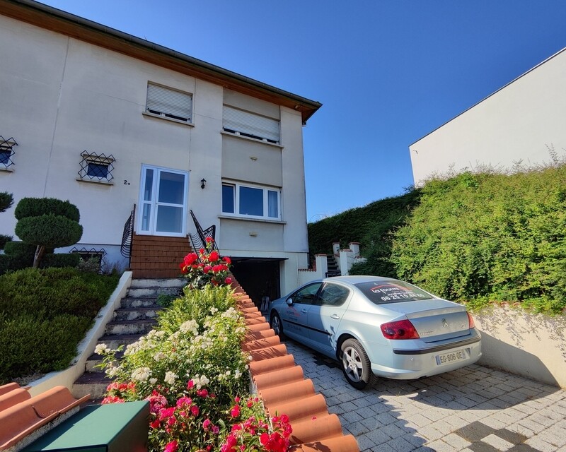 Charmante maison à Hochstatt offrant un potentiel de rénovation - façade avant