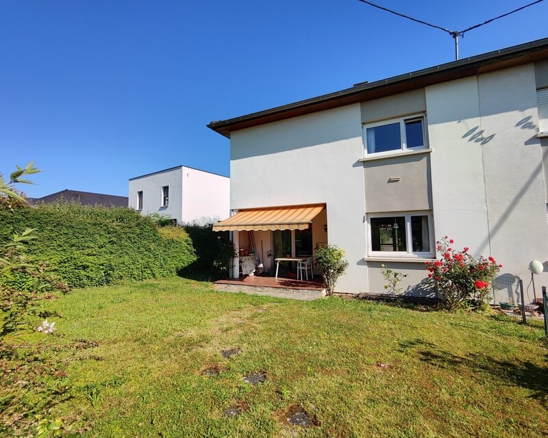 Charmante maison à Hochstatt offrant un potentiel de rénovation - façade arrière