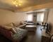 Ensemble immobilier, 1 local commercial et 2 appartements.  - Salon derras