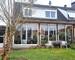 Maison Jumelée à fort potentiel de 96m² avec le garage - Façade arrière avec véranda