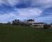 Maison de Famille sur 1 hectare avec dépendances - L'ensemble immobilier vu du fond du jardin qui se prolonge par des champs et des bois...