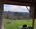 Maison de Famille sur 1 hectare avec dépendances - Belle fenêtre sur vue du garage 2 véhicules et de son abri avancé pour la coupe du bois...