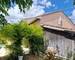 Maison dans quartier recherché - Garage en bois