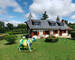  A vendre belle longère rénovée avec nombreuses annexes et bois privé. - Photo maison face sud