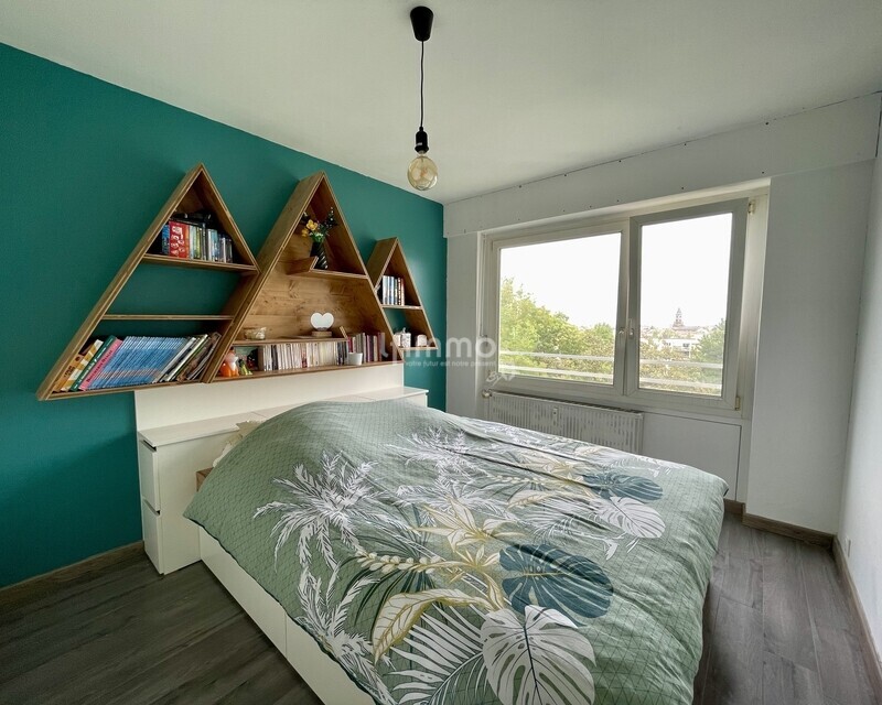 Lumineux 4 pièces avec balcon, vue dégagée et garage - Chambre 1